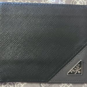 Prada Bifold Wallet. Purchased at Prada in Dallas. Good condition, minor wear